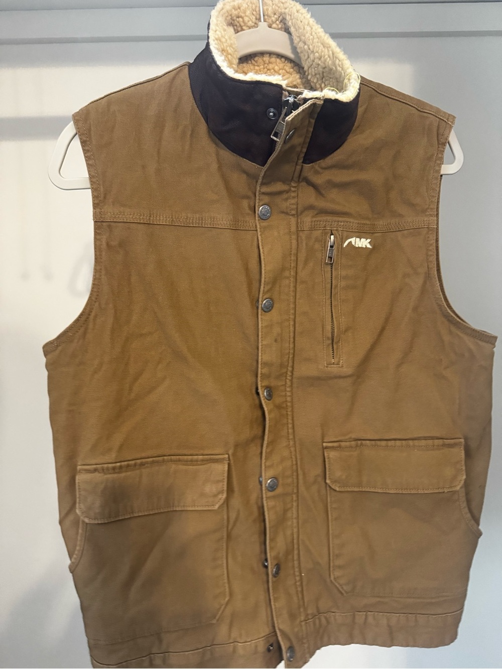 Mountain Khaki canvas vest.